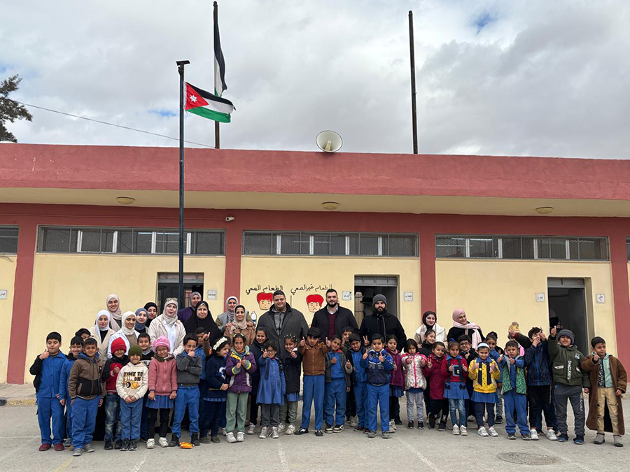 Photo of staff and students in school in Jordan